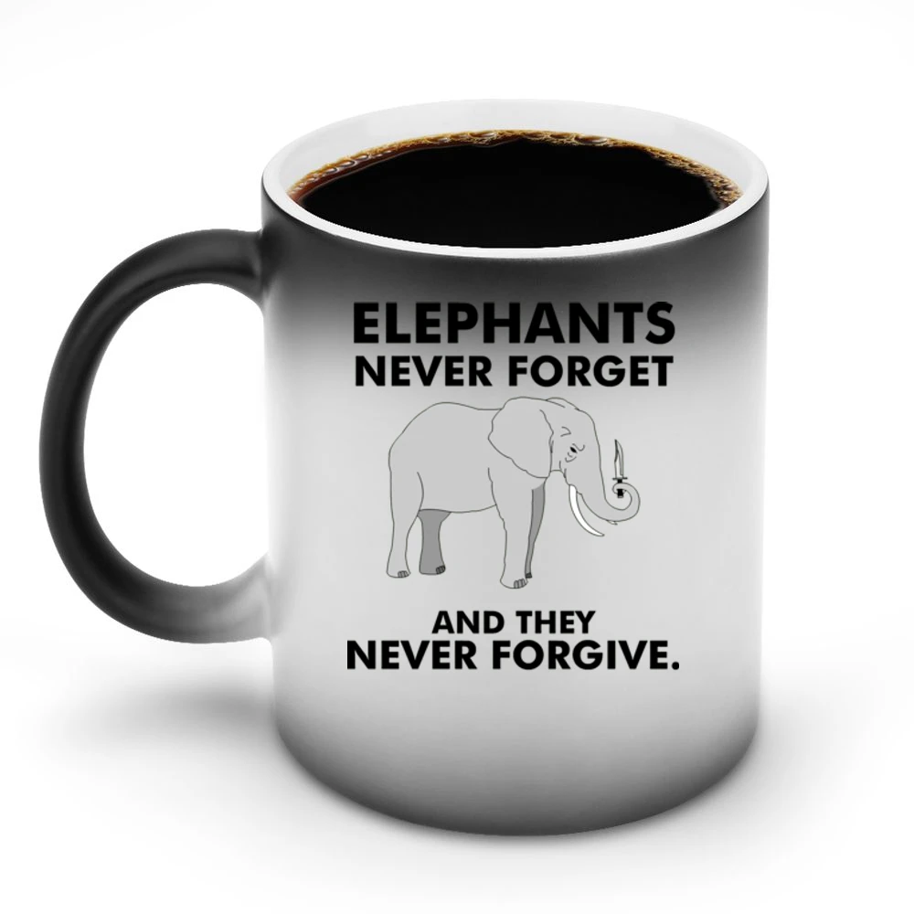 Funny elephan with knife - they never forget and they never forgive T Discoloration Mug