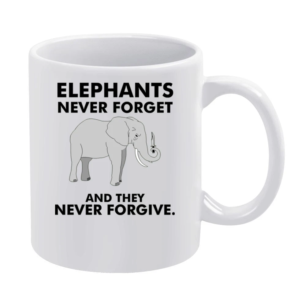 Funny elephan with knife - they never forget and they never forgive T White Mug