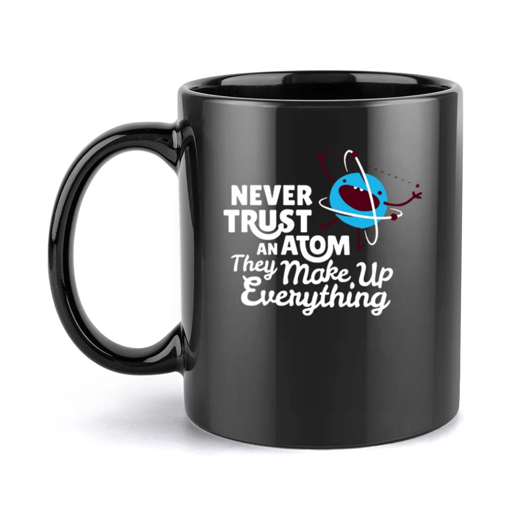 never trust atom jokes Black Mug